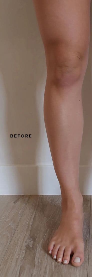 Self-tan before — fair-neutral legs against a soft white wall, no tan