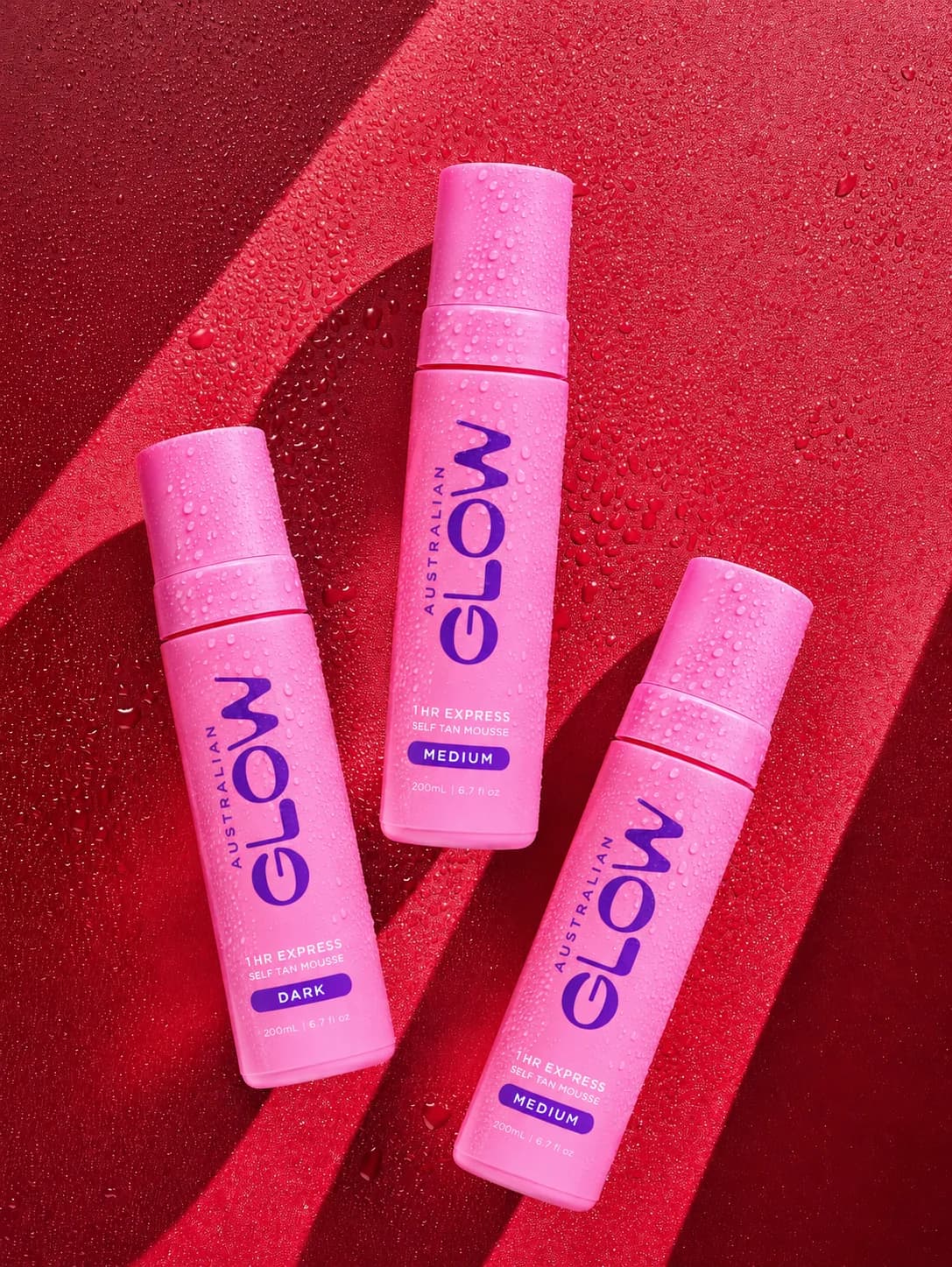 1 Hour Express Mousse trio on a red campaign backdrop